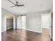 Spacious bedroom with wood floors, barn door, and ample closet space at 603 Canadice Rd, Huntersville, NC 28078