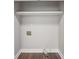 Laundry closet with shelving and hookups for washer and dryer at 603 Canadice Rd, Huntersville, NC 28078