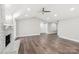 Bright living room with hardwood floors and a fireplace at 603 Canadice Rd, Huntersville, NC 28078