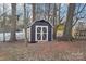 Dark grey storage shed in backyard at 603 Canadice Rd, Huntersville, NC 28078