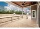 View of the home's wooden deck with ceiling fan and backyard at 6098 Ballard Rd, Denver, NC 28037