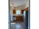 Well-lit kitchen featuring stainless steel appliances and ample counter space at 6140 Whispering Brook Ct, Charlotte, NC 28216