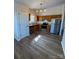 Well-lit kitchen featuring stainless steel appliances and ample counter space at 6140 Whispering Brook Ct, Charlotte, NC 28216