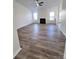 Spacious living room featuring a ceiling fan and fireplace at 6140 Whispering Brook Ct, Charlotte, NC 28216