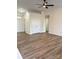 Spacious living room with wood floors and bright natural light at 6140 Whispering Brook Ct, Charlotte, NC 28216