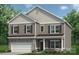 Two story home with stone accents, neutral color scheme, and a two car garage at 6332 Honor Ave, Midland, NC 28107