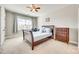 Bedroom with carpet flooring, windows, furniture, and a bed with blue pillows at 7191 Three Kings Rd, Fort Mill, SC 29715