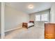 Bedroom with carpet flooring, single bed, and a dark wood dresser at 7191 Three Kings Rd, Fort Mill, SC 29715