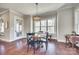 Dining area with wood floors and a window that provides natural light at 7191 Three Kings Rd, Fort Mill, SC 29715