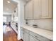 Well-organized kitchen features white cabinetry, quartz countertops, and subway tile backsplash at 7191 Three Kings Rd, Fort Mill, SC 29715