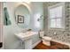 Charming powder room with pedestal sink, patterned wallpaper, and natural light at 7191 Three Kings Rd, Fort Mill, SC 29715