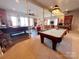 Finished basement with pool table, foosball table and wet bar at 7535 Rabbit Cir, Denver, NC 28037