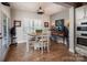 Charming dining area featuring a table for four, modern appliances, and a coffee bar, perfect for casual meals at 7535 Rabbit Cir, Denver, NC 28037