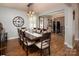 Spacious dining room featuring a large table and seamless flow to other living areas at 7535 Rabbit Cir, Denver, NC 28037