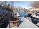 Lakefront dock equipped with boat lifts and convenient access to open water and boating activities at 7535 Rabbit Cir, Denver, NC 28037