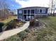 House exterior showcasing landscaping and walkway at 7535 Rabbit Cir, Denver, NC 28037