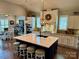 Spacious kitchen with an island, stainless steel appliances, and white cabinets at 7535 Rabbit Cir, Denver, NC 28037