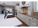 Beautiful kitchen island with modern appliances, lots of cabinets, granite counters and a breakfast area at 7535 Rabbit Cir, Denver, NC 28037