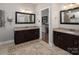 Elegant main bathroom with dual vanities, granite countertops, and a doorway leading to the main bedroom at 7535 Rabbit Cir, Denver, NC 28037