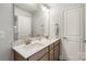 Elegant bathroom with double sinks and a large mirror at 821 Bethesda Rd, Statesville, NC 28677