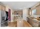 Modern kitchen featuring granite countertops and ample cabinetry at 821 Bethesda Rd, Statesville, NC 28677