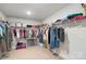 Spacious walk-in closet with ample shelving and hanging rods at 821 Bethesda Rd, Statesville, NC 28677