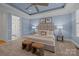 Spacious bedroom with carpeted floor, large bed, and plenty of natural light at 8928 Heydon Hall Cir, Charlotte, NC 28210