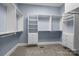 Bright walk-in closet with ample hanging space and drawers at 8928 Heydon Hall Cir, Charlotte, NC 28210