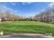 Large grassy community common area for resident recreational activity at 8928 Heydon Hall Cir, Charlotte, NC 28210