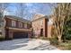 Brick home with two-car garage and manicured landscaping at 8928 Heydon Hall Cir, Charlotte, NC 28210