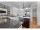 Modern kitchen with stainless steel appliances and granite countertops at 8928 Heydon Hall Cir, Charlotte, NC 28210