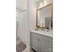 Bright bathroom with a shower/tub combination and a large vanity at 907 Millbrook Rd, Charlotte, NC 28211