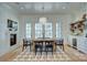 Elegant dining room with a farmhouse table and access to the backyard at 961 Jw Wilson Rd, Fort Mill, SC 29715