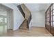 Bright entryway with hardwood floors, staircase, and french doors at 961 Jw Wilson Rd, Fort Mill, SC 29715