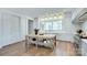 White kitchen with butcher block island and large window overlooking the backyard at 961 Jw Wilson Rd, Fort Mill, SC 29715