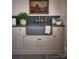 Laundry room with apron-front sink and dark countertop at 961 Jw Wilson Rd, Fort Mill, SC 29715