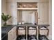 Laundry room with farmhouse sink, built-in cabinets and shelves at 961 Jw Wilson Rd, Fort Mill, SC 29715