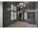 Home office with built-in shelves, window with shutters, and gray walls at 961 Jw Wilson Rd, Fort Mill, SC 29715