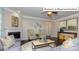 Spacious living room with fireplace and comfortable seating at 1033 Merganser Way, Indian Trail, NC 28079