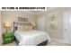 Well-lit bedroom with a comfortable bed and neutral color palette at 110 Sari St, Troutman, NC 28166