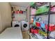 Laundry room with washer, dryer, and shelving at 1301 Brandy Ln # 7, Shelby, NC 28152