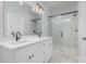 Elegant bathroom with white vanity, quartz countertops, and a large walk-in shower at 136 Autumn Blaze Rd, China Grove, NC 28023