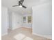 Well lit bedroom with neutral walls, hardwood floors and ceiling fan at 136 Autumn Blaze Rd, China Grove, NC 28023