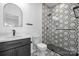 Stylish bathroom with hexagonal tile and a walk-in shower at 140 3Rd Se Ave, Hickory, NC 28602