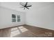 Spacious bedroom with hardwood floors and large windows at 140 3Rd Se Ave, Hickory, NC 28602