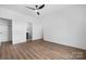 Bright bedroom with hardwood floors, ceiling fan and en-suite bathroom at 140 3Rd Se Ave, Hickory, NC 28602