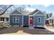 Newly built home with blue siding, red door, and landscaped yard at 140 3Rd Se Ave, Hickory, NC 28602