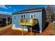 Back of house, blue siding, deck, and yard at 140 3Rd Se Ave, Hickory, NC 28602