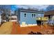 Back of house, blue siding, deck, and yard at 140 3Rd Se Ave, Hickory, NC 28602