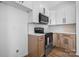 Modern kitchen with stainless steel appliances and light wood cabinets at 140 3Rd Se Ave, Hickory, NC 28602